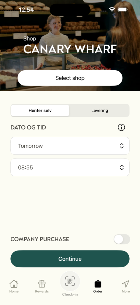 Interface de l'application Ole and Steen pour sélectionner l'emplacement d'un magasin et programmer une heure de ramassage ou de livraison