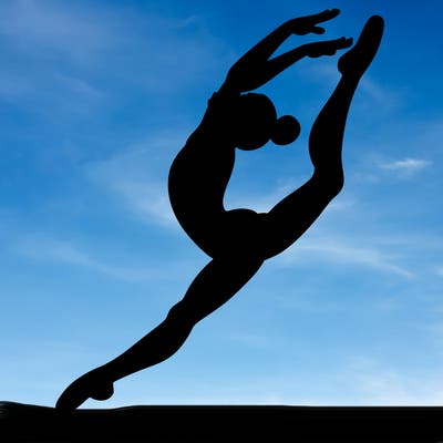 gymnast doing a leap in a leotard with a bent back leg