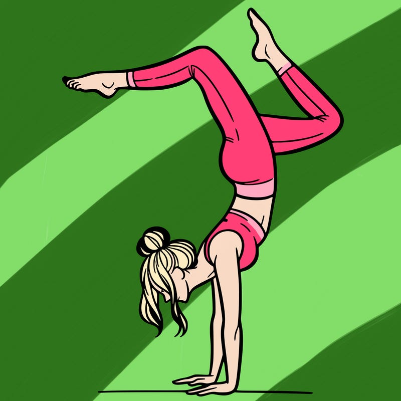 a woman doing a handstand
