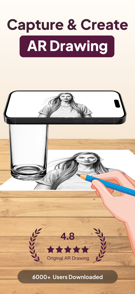 AR Drawing App: Sketch & Paint - Hand tracing a portrait on paper using the AR drawing app projected from a smartphone