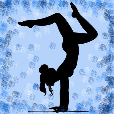 a woman doing a handstand