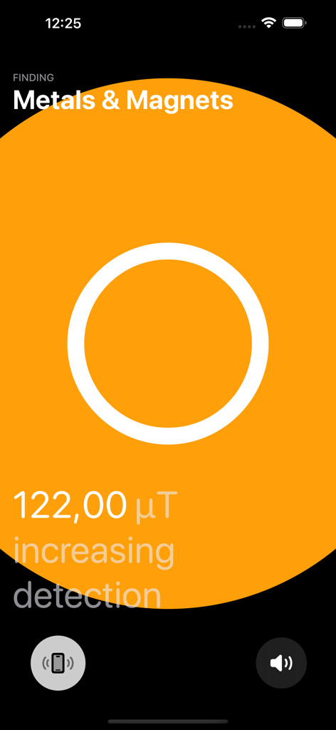 Screenshot of Magnetometer app showing a detection reading of 122 microtesla for metals and magnets with an orange circular interface.