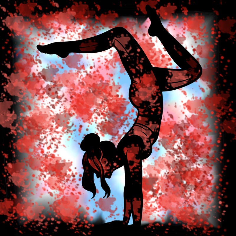 a woman doing a handstand