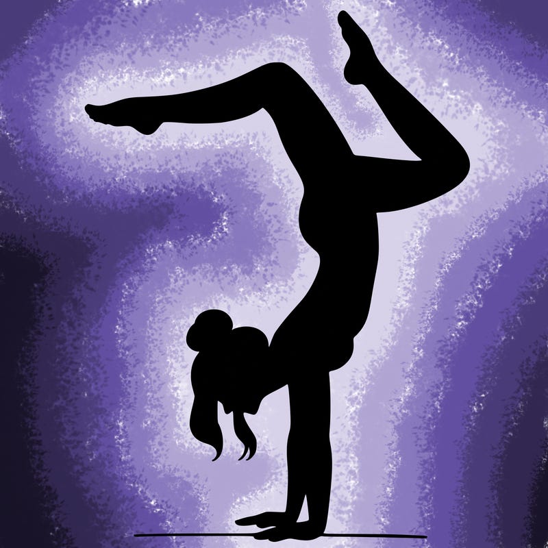 a woman doing a handstand