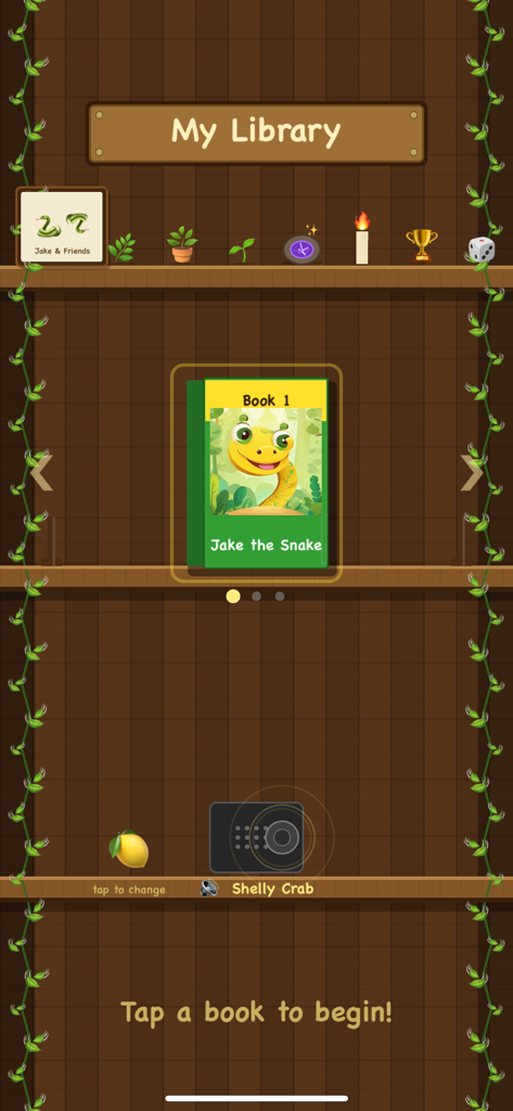JTS Typing Game - The My Library screen showing the Jake the Snake storybook on a wooden shelf interface.