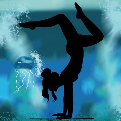 a woman doing a handstand