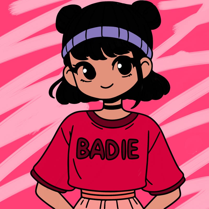 a girl in a shirt that says "badie"