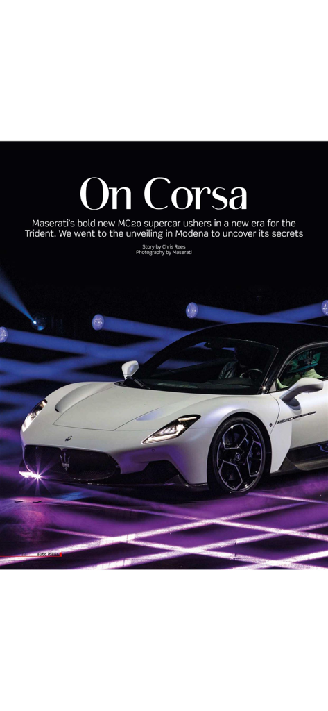 Auto Italia - A white Maserati MC20 supercar featured in an Auto Italia magazine article about its unveiling in Modena