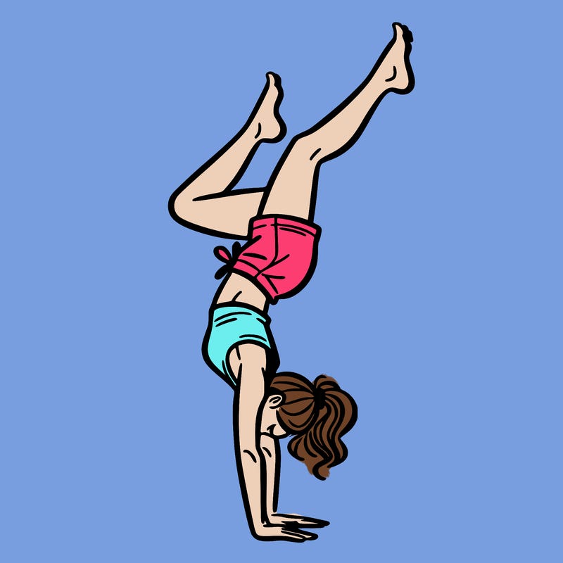 woman doing a hand stand
