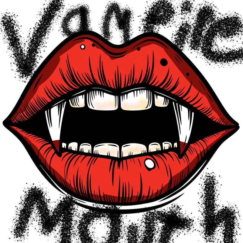 lips with vampire teeth