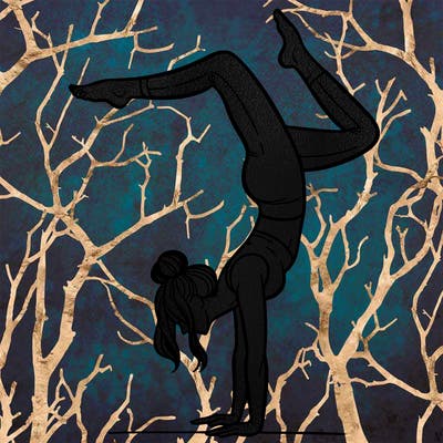 a woman doing a handstand