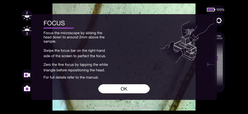ioLight Microscope app interface showing focus instructions and fine focus slider over a microscopic image
