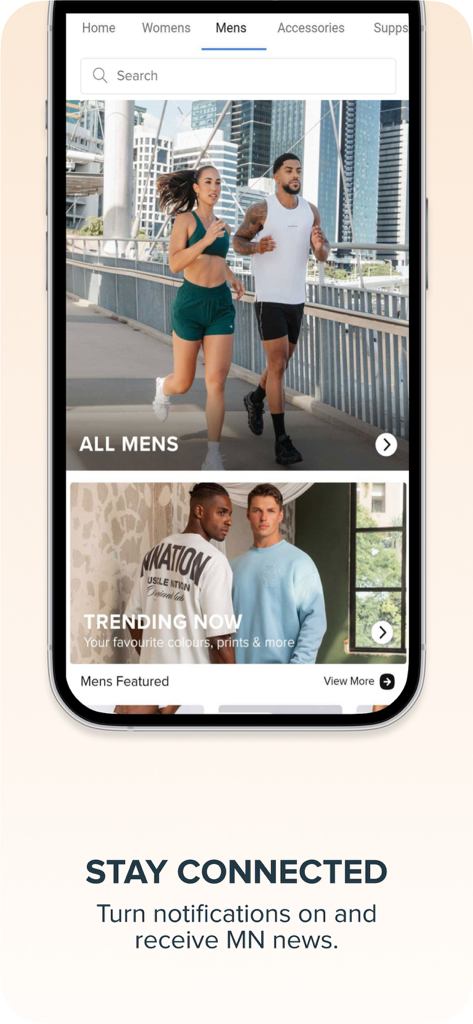 The Muscle Nation mobile app interface showing the mens fitness clothing category and trending athletic wear collections