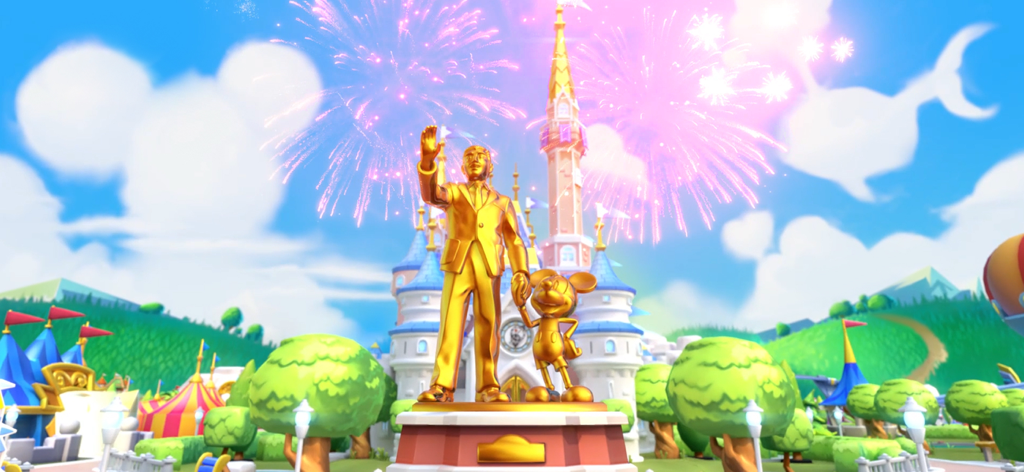 Disney Magic Kingdoms - Goldene Statue von Walt Disney und Micky Maus mit Feuerwerk und einem Schloss im Hintergrund