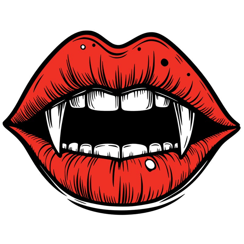 lips with vampire teeth