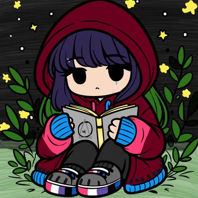 girl in oversized hoodie reading a book