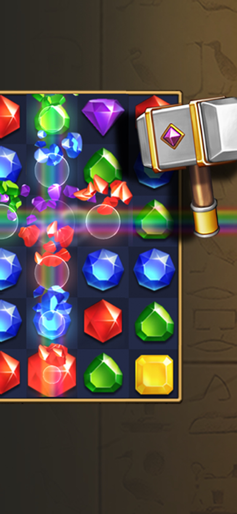 Jewels Pharaoh - Un potenciador de martillo rompiendo gemas coloridas en el juego de puzzle Match-3 de Jewels Pharaoh