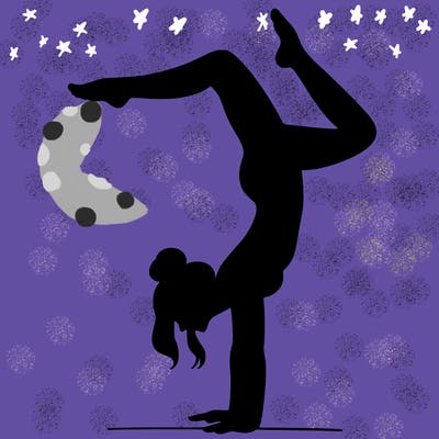 a woman doing a handstand