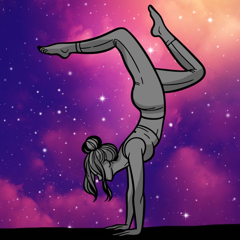 a woman doing a handstand