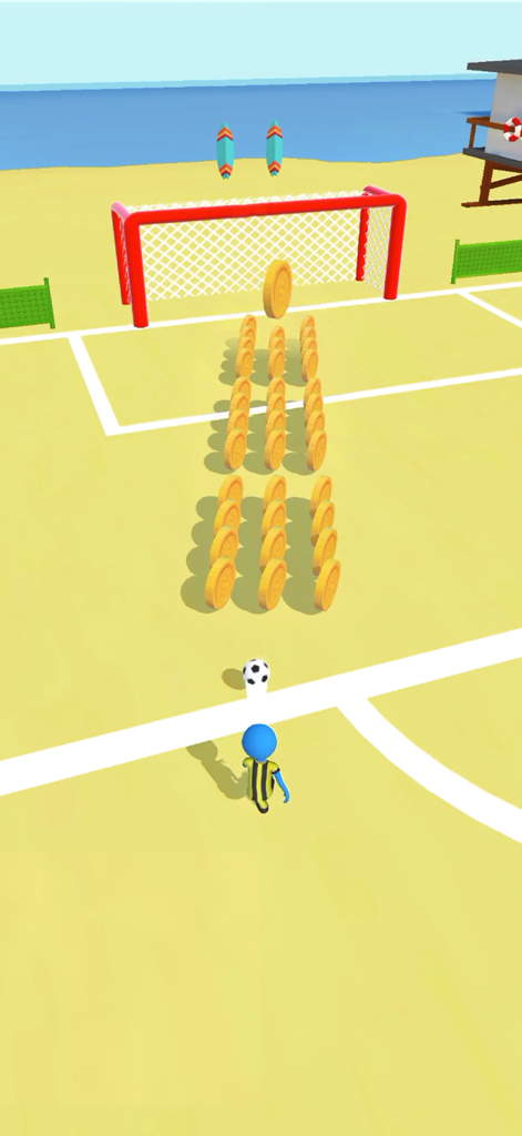 Kick to Score - A soccer player aiming to kick a ball through rows of gold coins toward a goal on a beach.