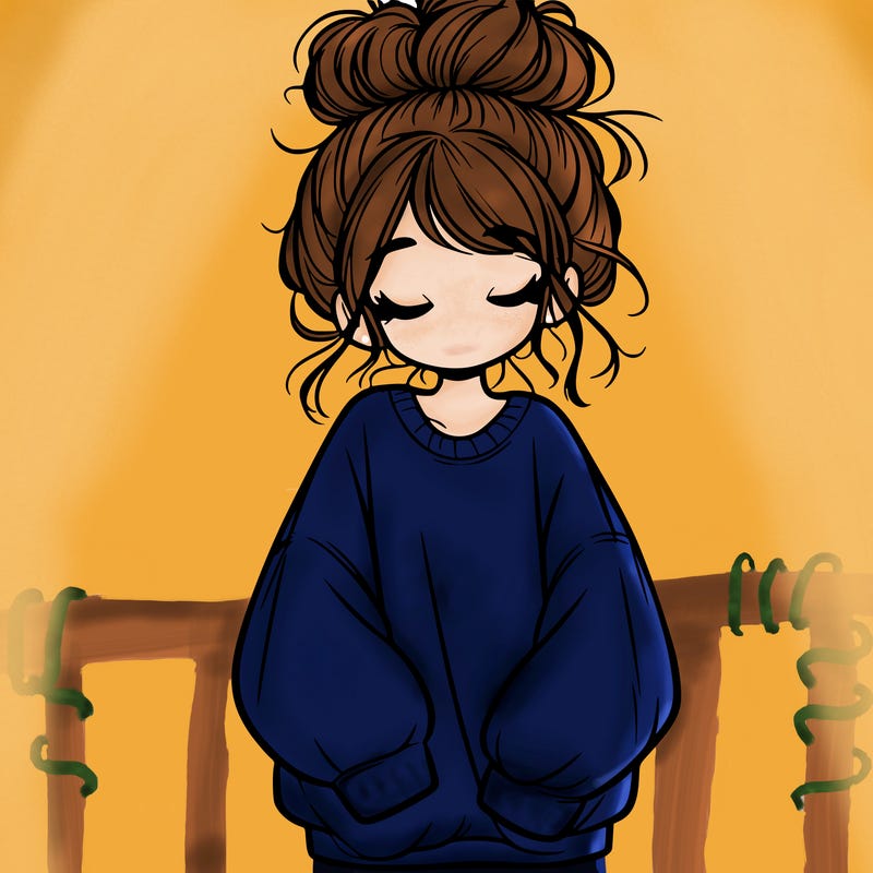 girl with baggy sweatshirt and messy bun