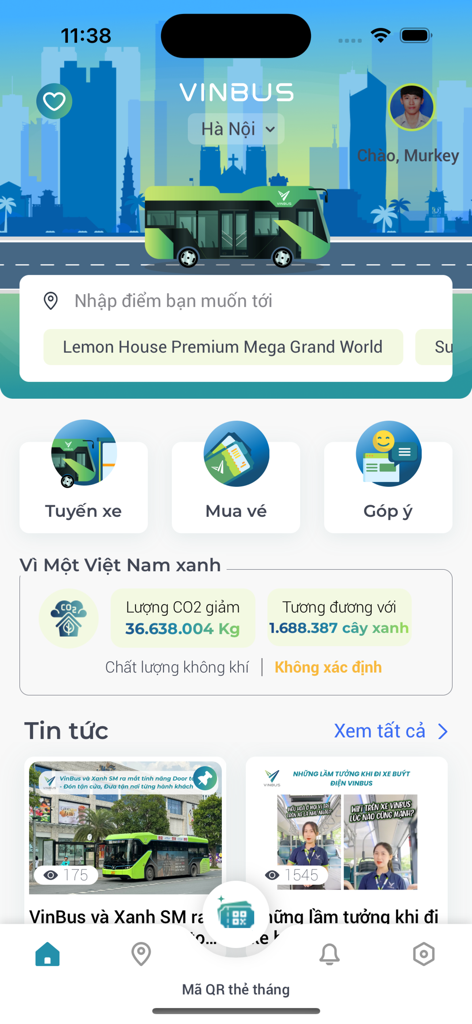 The VinBus app home screen featuring a green electric bus illustration with options for bus routes ticket booking and environmental impact statistics