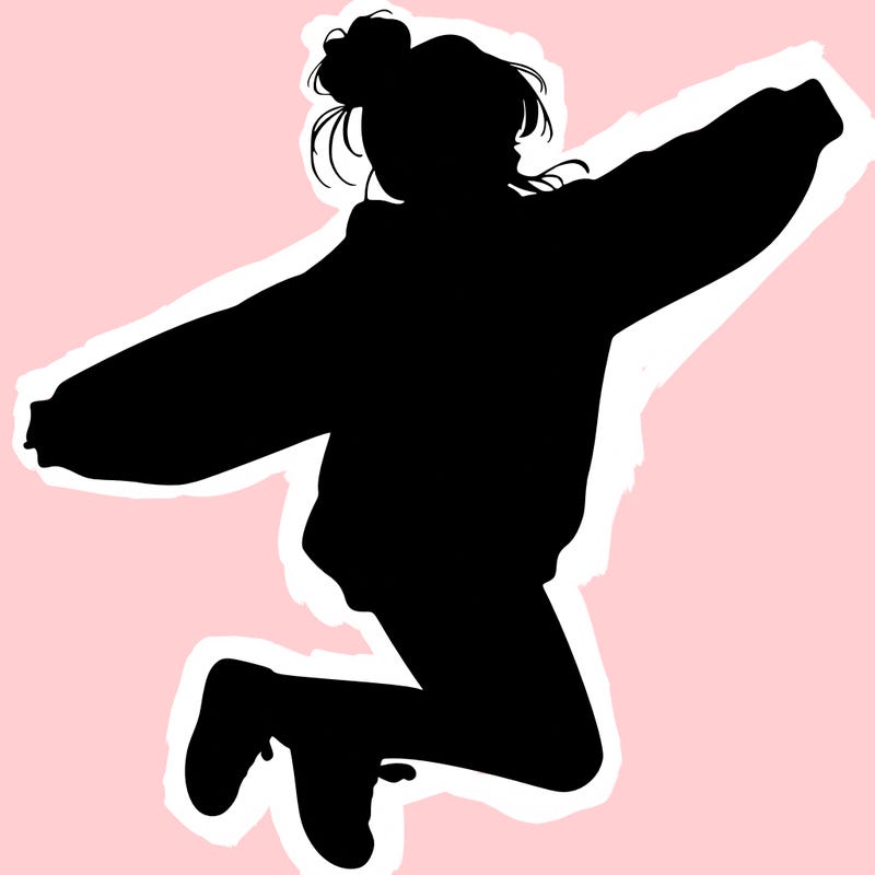 realistic girl jumping with a bun and oversized sweatshirt