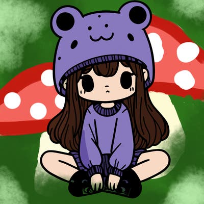 a girl wearing a frog hat and some frog socks