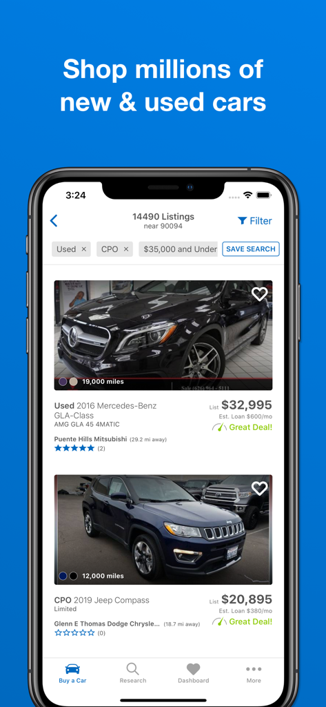 Smartphone screen displaying used car listings and prices on the Edmunds app