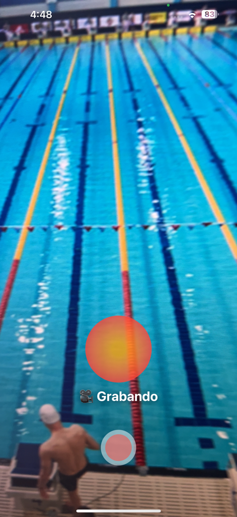 SwimCam - Swimmer on starting block at an indoor pool with a recording interface overlay