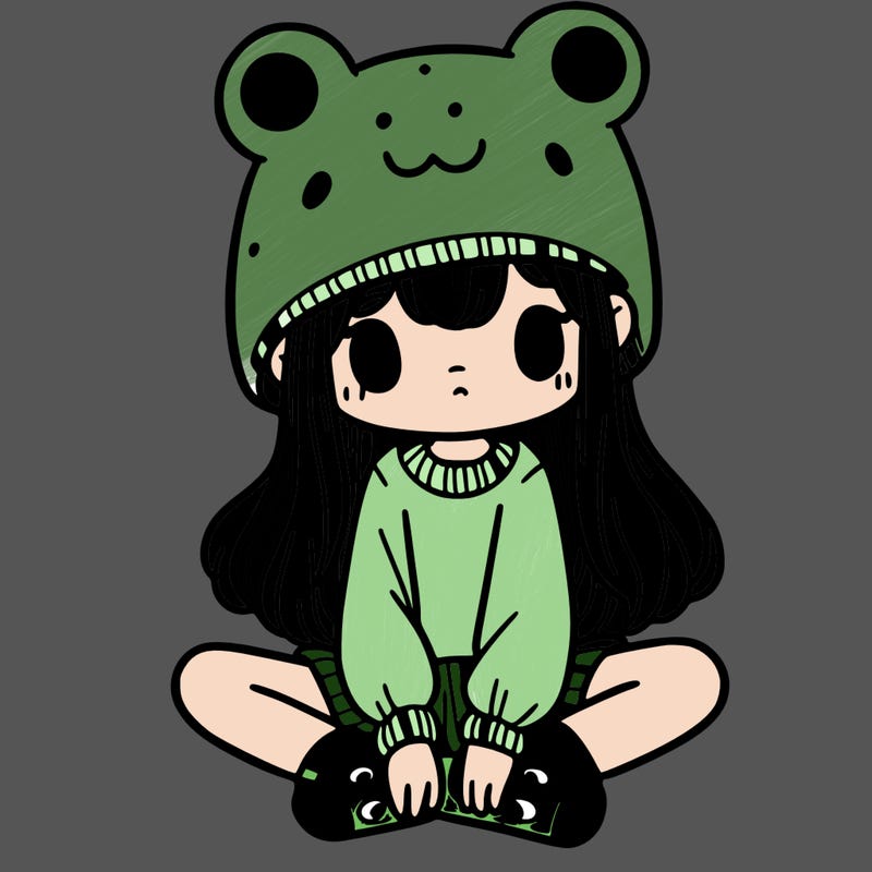 a girl wearing a frog hat and some frog socks