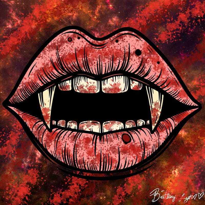 lips with vampire teeth