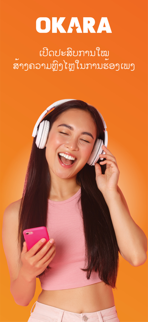 Okara - Laos Karaoke - A woman wearing headphones and holding a smartphone while singing on the Okara Laos Karaoke app