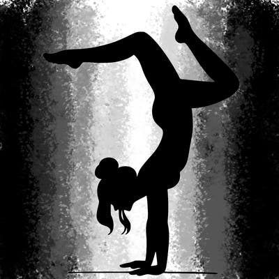 a woman doing a handstand