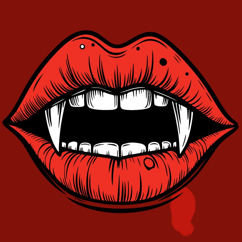 lips with vampire teeth