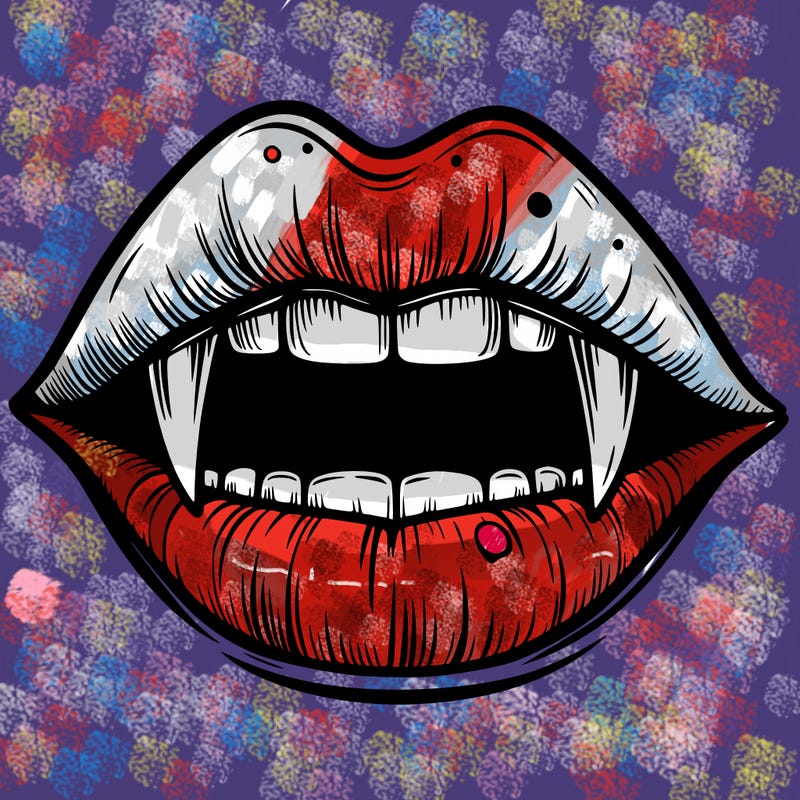 lips with vampire teeth