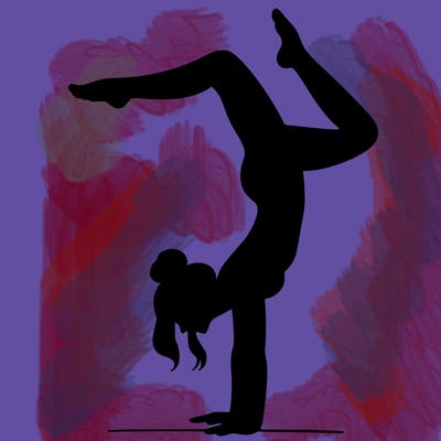 a woman doing a handstand