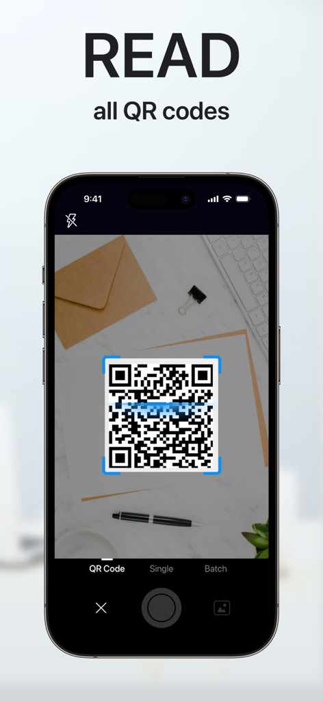 Smartphone screen showing the PDF scanner app scanning a QR code on a desk