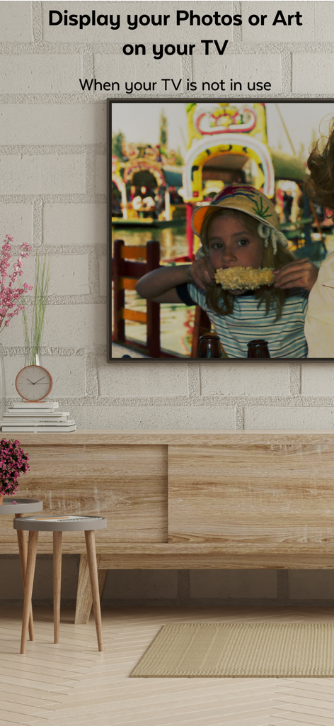 A Smart TV displaying a family photo in a modern living room