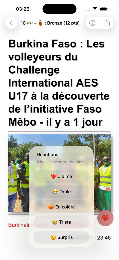 Mobile news article interface for Burkina Faso with an interactive emoji reaction menu.