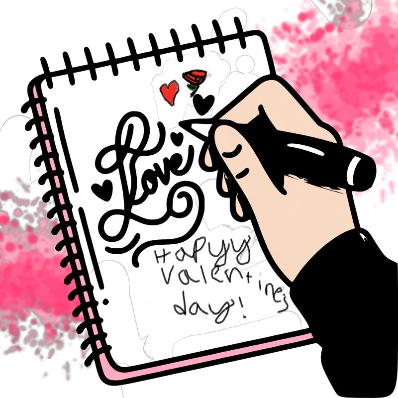 a hand writing “love” in calligraphy on a notebook