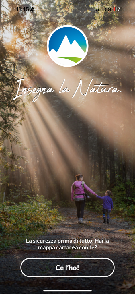 TABACCOmapp 3.0 - A woman and child walking on a sunlit forest trail on the TABACCOmapp welcome screen.