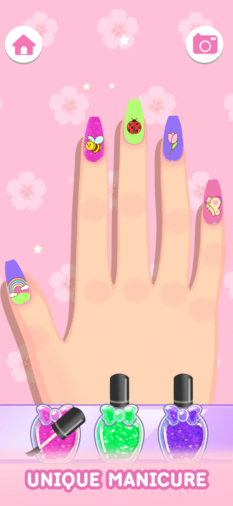 Nail Games: Salon for Girls - A hand with unique nail art designs featuring cute stickers and colorful nail polish.
