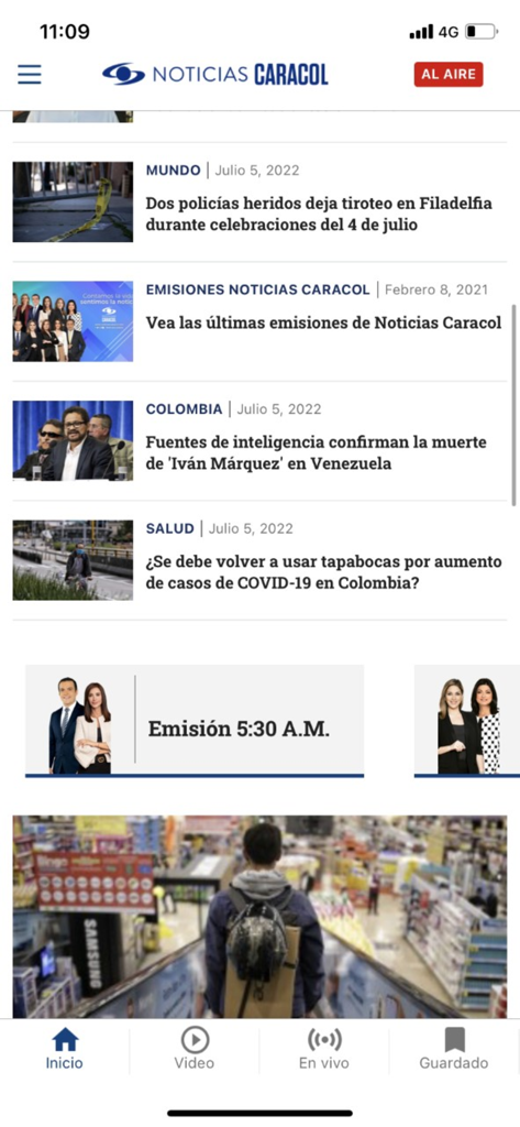 Screenshot of the Noticias Caracol app showing a list of news headlines from Colombia and the world with a bottom navigation bar.