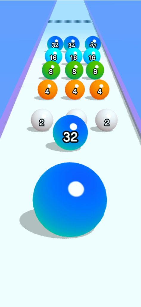Gameplay de Ball Run 2048 montrant des balles numérotées fusionnant sur une piste