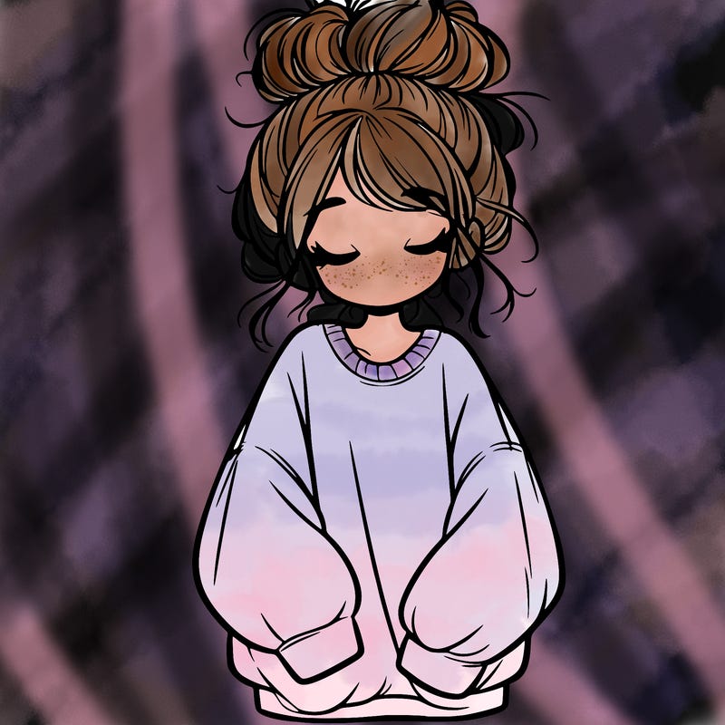 girl with baggy sweatshirt and messy bun