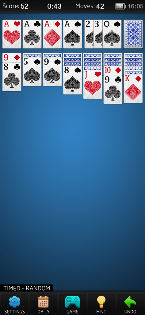 Gameplay screenshot of Solitaire Card Solitaire showing a classic card layout on a blue background
