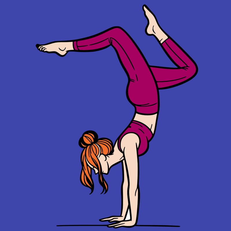 a woman doing a handstand
