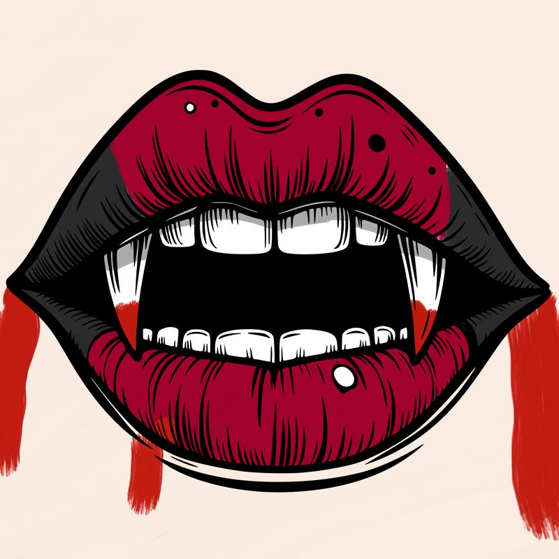 lips with vampire teeth