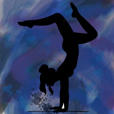 a woman doing a handstand